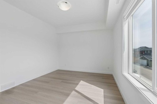 1001-24 Rivercrest Drive, Cochrane, AB - Indoor Photo Showing Other Room