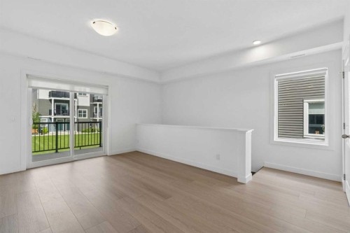 1001-24 Rivercrest Drive, Cochrane, AB - Indoor Photo Showing Other Room