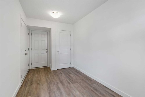 1001-24 Rivercrest Drive, Cochrane, AB - Indoor Photo Showing Other Room