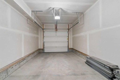1001-24 Rivercrest Drive, Cochrane, AB - Indoor Photo Showing Garage