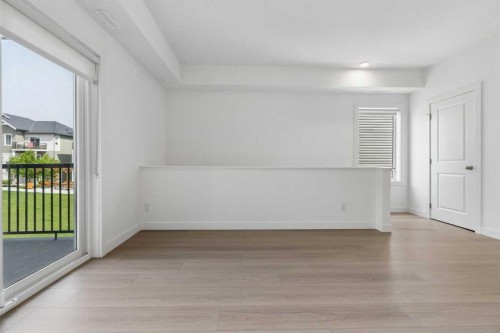 1001-24 Rivercrest Drive, Cochrane, AB - Indoor Photo Showing Other Room