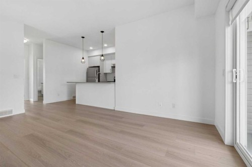 1001-24 Rivercrest Drive, Cochrane, AB - Indoor Photo Showing Kitchen