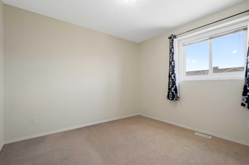 321 Sunrise Terrace Ne, High River, AB - Indoor Photo Showing Other Room