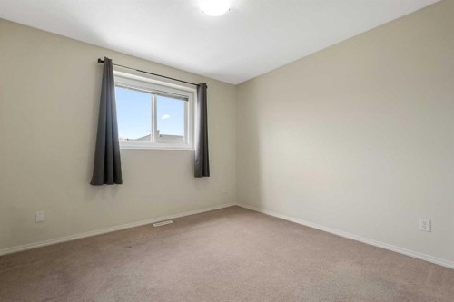 321 Sunrise Terrace Ne, High River, AB - Indoor Photo Showing Other Room