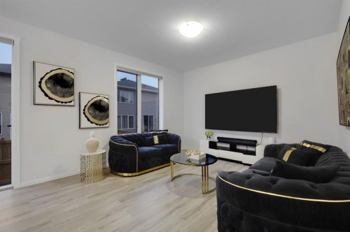 610 Southwinds Close Sw, Airdrie, AB - Indoor Photo Showing Living Room