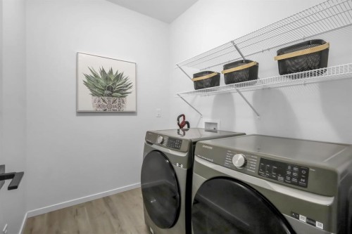 610 Southwinds Close Sw, Airdrie, AB - Indoor Photo Showing Laundry Room