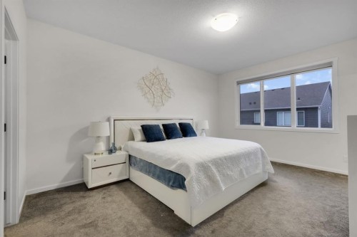 610 Southwinds Close Sw, Airdrie, AB - Indoor Photo Showing Bedroom