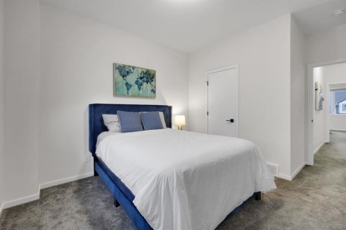610 Southwinds Close Sw, Airdrie, AB - Indoor Photo Showing Bedroom