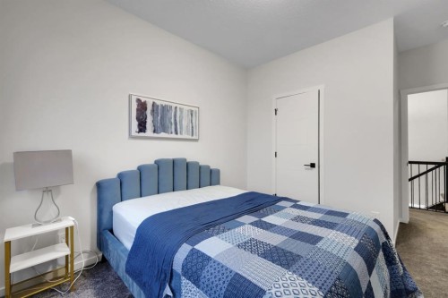 610 Southwinds Close Sw, Airdrie, AB - Indoor Photo Showing Bedroom