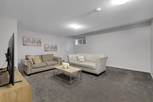 610 Southwinds Close Sw, Airdrie, AB - Indoor Photo Showing Living Room