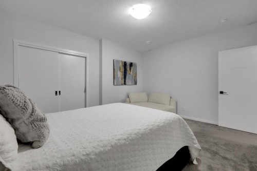 610 Southwinds Close Sw, Airdrie, AB - Indoor Photo Showing Bedroom