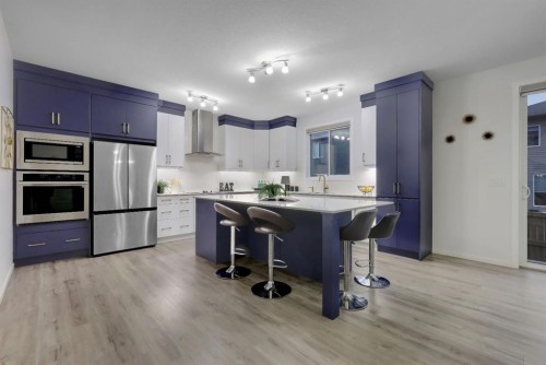 610 Southwinds Close Sw, Airdrie, AB - Indoor Photo Showing Kitchen With Upgraded Kitchen