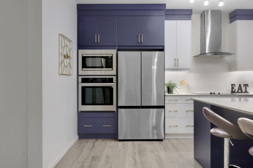 610 Southwinds Close Sw, Airdrie, AB - Indoor Photo Showing Kitchen With Upgraded Kitchen
