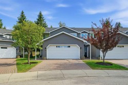 16 Wood Crescent SW Calgary, AB T2W 4B6