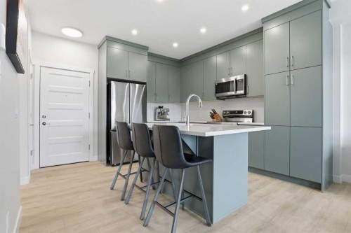 2405-2117 81 Street Sw, Calgary, AB - Indoor Photo Showing Kitchen With Stainless Steel Kitchen With Upgraded Kitchen