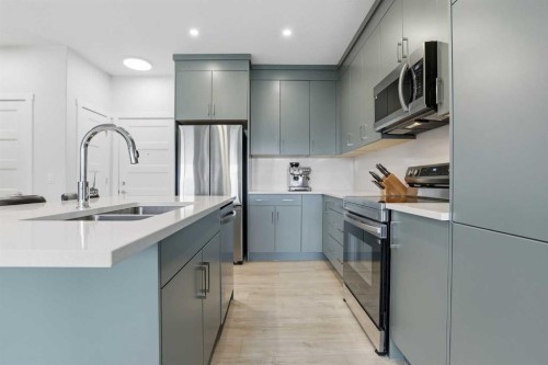 2405-2117 81 Street Sw, Calgary, AB - Indoor Photo Showing Kitchen With Stainless Steel Kitchen With Double Sink With Upgraded Kitchen