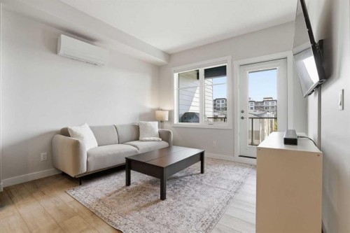 2405-2117 81 Street Sw, Calgary, AB - Indoor Photo Showing Living Room