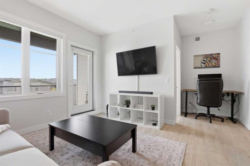 2405-2117 81 Street Sw, Calgary, AB - Indoor Photo Showing Living Room