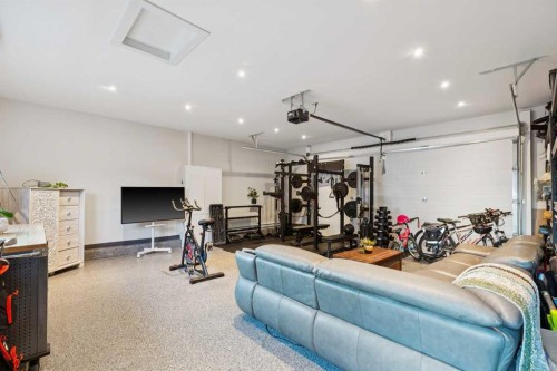 16 Calandar Road Nw, Calgary, AB - Indoor Photo Showing Gym Room
