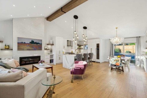 16 Calandar Road Nw, Calgary, AB - Indoor Photo Showing Living Room With Fireplace
