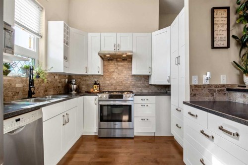 336 Butte Place, Stavely, AB - Indoor Photo Showing Kitchen With Double Sink With Upgraded Kitchen