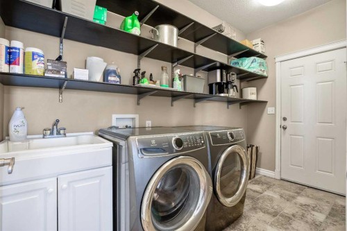 336 Butte Place, Stavely, AB - Indoor Photo Showing Laundry Room