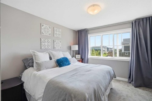 332 Lawthorn Way Se, Airdrie, AB - Indoor Photo Showing Bedroom