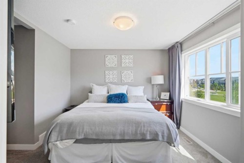 332 Lawthorn Way Se, Airdrie, AB - Indoor Photo Showing Bedroom