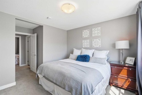 332 Lawthorn Way Se, Airdrie, AB - Indoor Photo Showing Bedroom