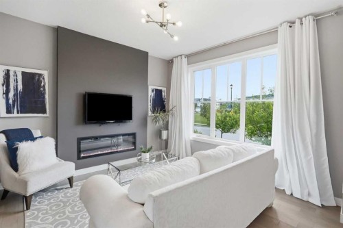 332 Lawthorn Way Se, Airdrie, AB - Indoor Photo Showing Living Room With Fireplace