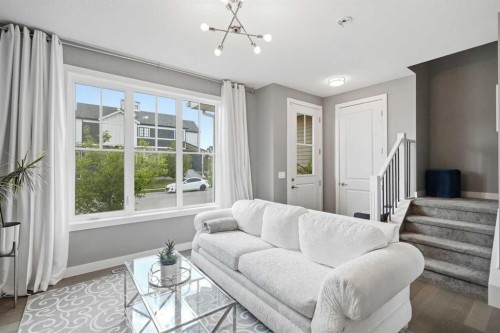 332 Lawthorn Way Se, Airdrie, AB - Indoor Photo Showing Living Room