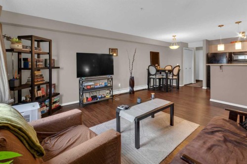 1310-4975 130 Avenue Se, Calgary, AB - Indoor Photo Showing Living Room