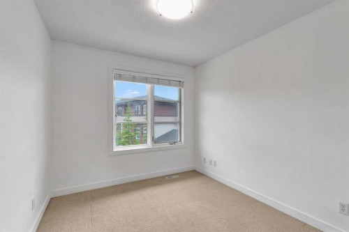 55 Aspen Hill Green Sw, Calgary, AB - Indoor Photo Showing Other Room
