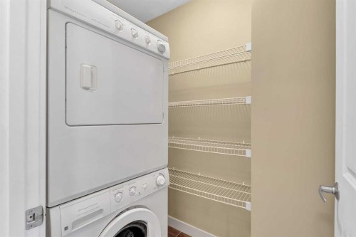 55 Aspen Hill Green Sw, Calgary, AB - Indoor Photo Showing Laundry Room