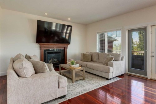 156 Camden Court, Strathmore, AB - Indoor Photo Showing Living Room With Fireplace