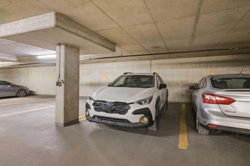1008-1111 6 Avenue Sw, Calgary, AB - Indoor Photo Showing Garage