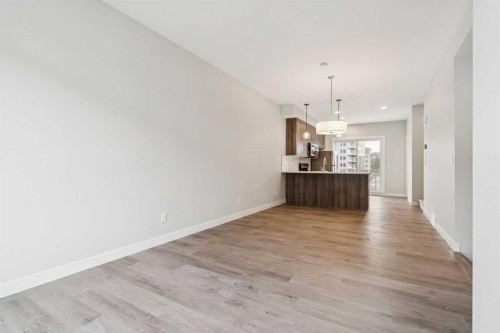 107 Shawnee Square Sw, Calgary, AB 
