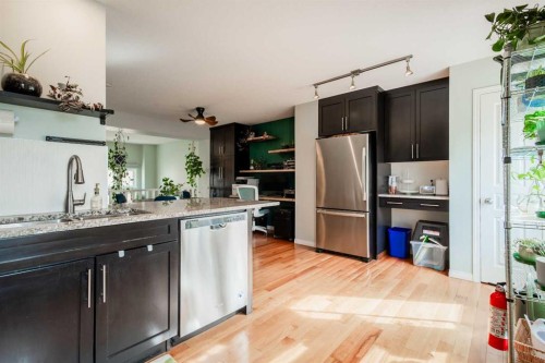 1310 Auburn Bay Square Se, Calgary, AB - Indoor Photo Showing Kitchen With Stainless Steel Kitchen With Double Sink