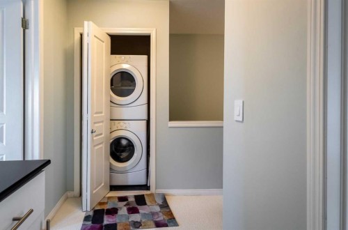 1310 Auburn Bay Square Se, Calgary, AB - Indoor Photo Showing Laundry Room