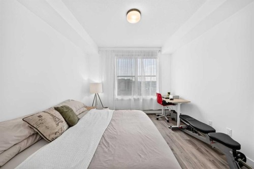316-205 Spring Creek Common Sw, Calgary, AB - Indoor Photo Showing Bedroom