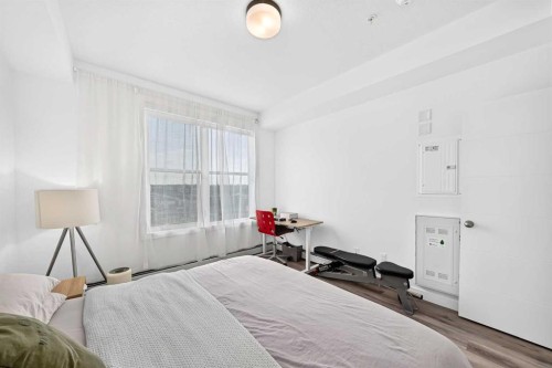 316-205 Spring Creek Common Sw, Calgary, AB - Indoor Photo Showing Bedroom