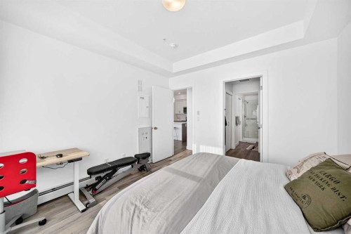 316-205 Spring Creek Common Sw, Calgary, AB - Indoor Photo Showing Bedroom