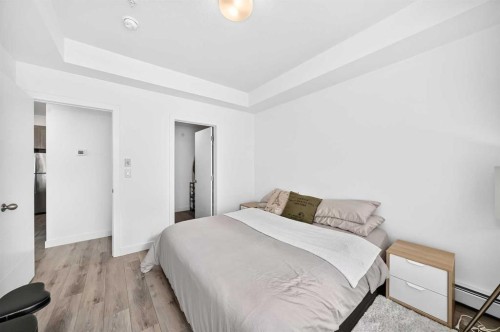 316-205 Spring Creek Common Sw, Calgary, AB - Indoor Photo Showing Bedroom