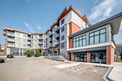 316-205 Spring Creek Common Sw, Calgary, AB - Outdoor With Balcony With Facade