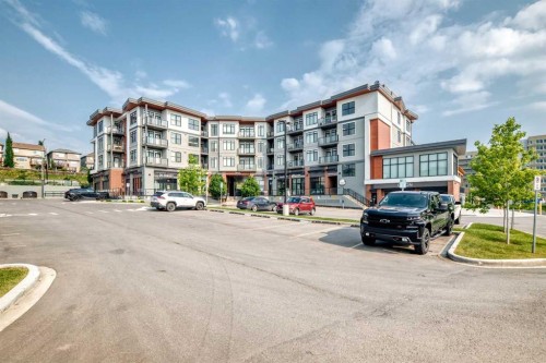 316-205 Spring Creek Common Sw, Calgary, AB - Outdoor With Balcony With Facade
