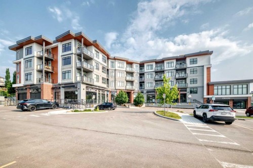 316-205 Spring Creek Common Sw, Calgary, AB - Outdoor With Balcony With Facade