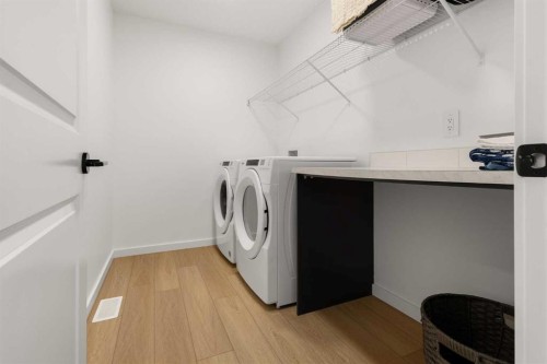 50 Royston Terrace Nw, Calgary, AB - Indoor Photo Showing Laundry Room