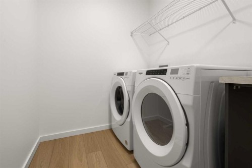 50 Royston Terrace Nw, Calgary, AB - Indoor Photo Showing Laundry Room