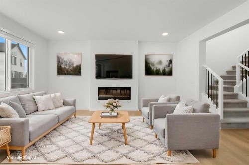 50 Royston Terrace Nw, Calgary, AB - Indoor Photo Showing Living Room With Fireplace