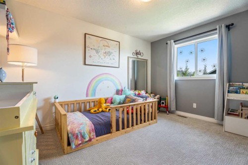 7 Crystal Green Way, Okotoks, AB - Indoor Photo Showing Bedroom